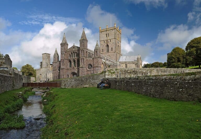 St Davids Cathedral seen across the River Alun on a sunny day, St Davids, Pembrokeshire